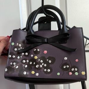 Chic Black and Purple Mini Bag with Star Accents